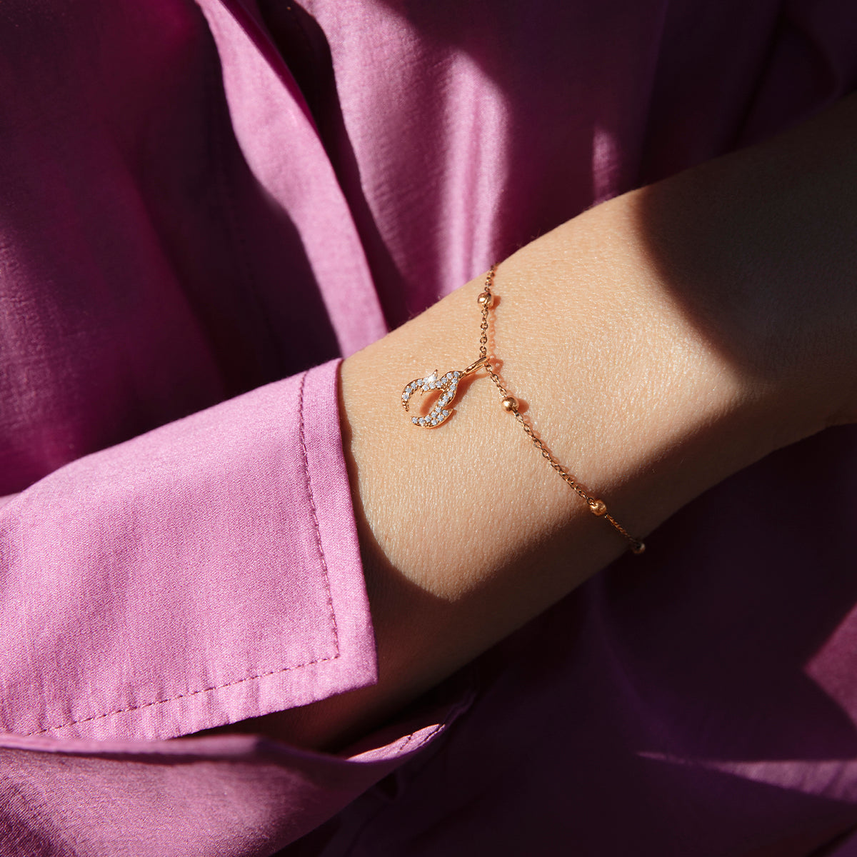 Armband Kugeln mit 1,2 cm Flamme-Anhänger mit Zirkonia vergoldet - Vorderansicht