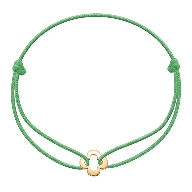 Armband mit vergoldetem Kleeblatt auf dünnem grasgrünem Band