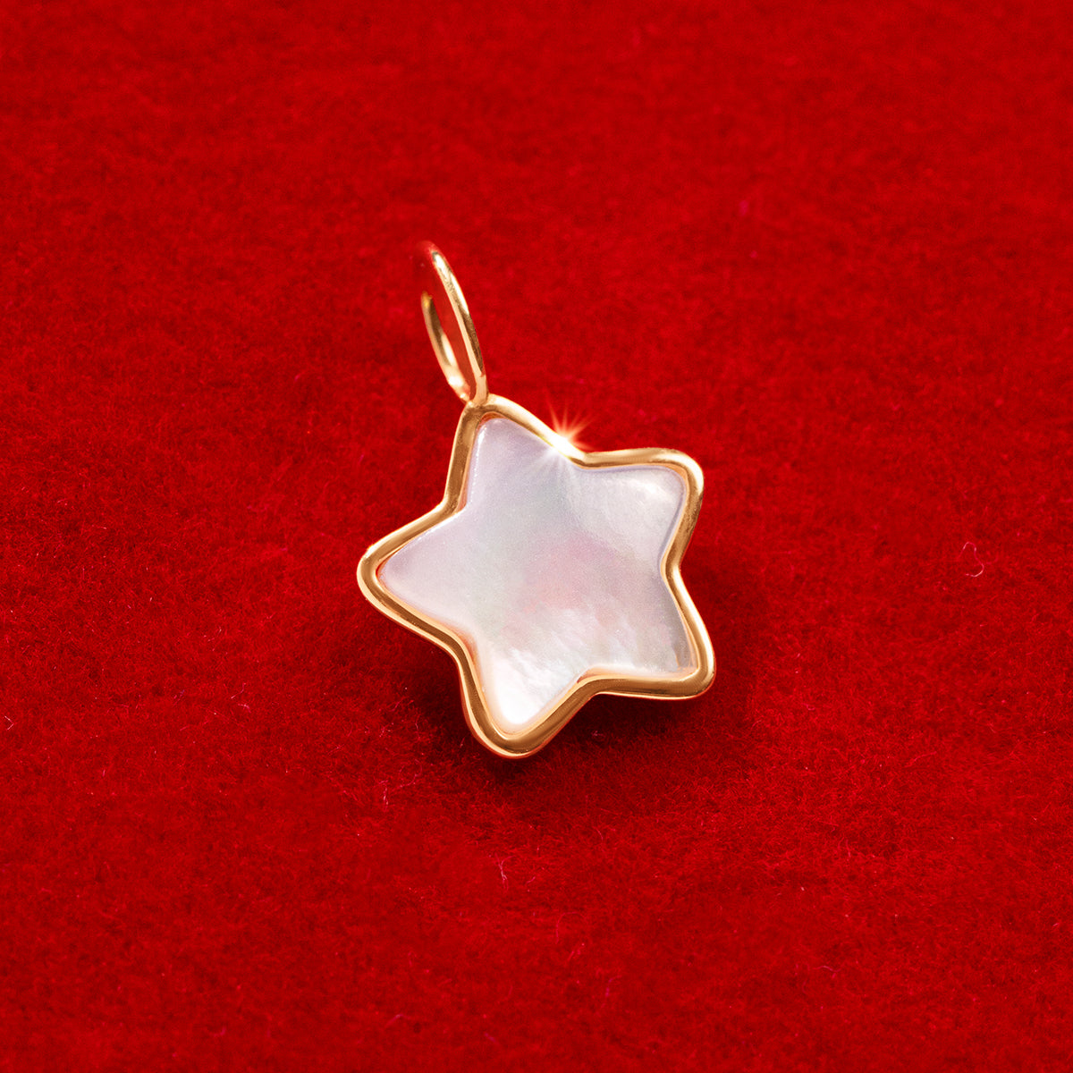 Anhänger Perlmutt Stern 0,8 cm in 585er Gelbgold Fassung
