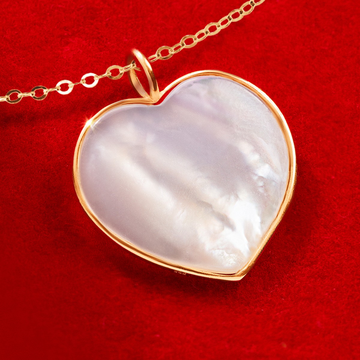 Halskette Forzatina mit einem 1,5 cm Herzen aus Perlmutt in einem 585 Goldrahmen