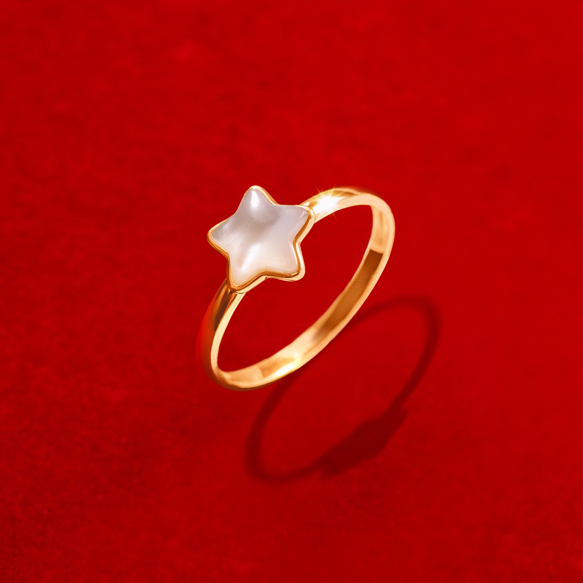 Ring mit Perlmutt Stern n 585er Gelbgold Fassung